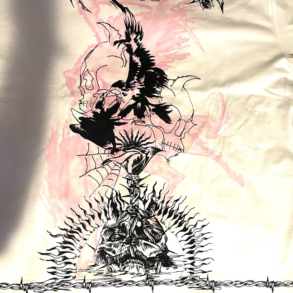 Mens over sized Large Givenchy tee shirt never worn with tags wrapped.
